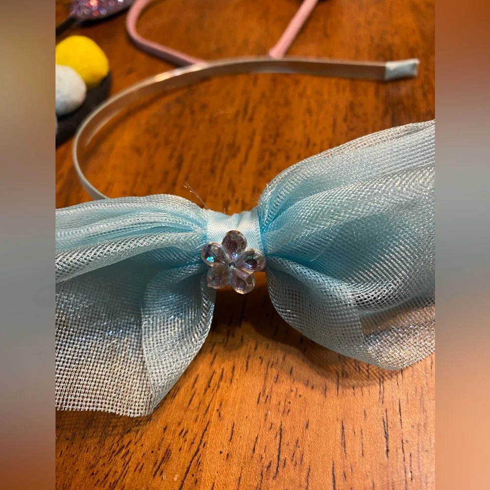 Child’s head bands.  Eight total.